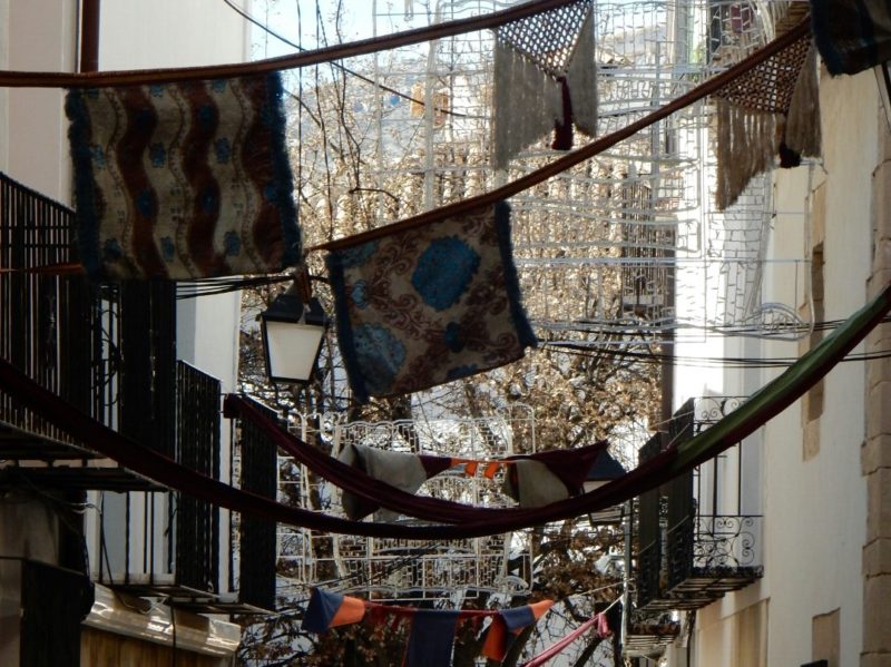 Flags, banners, railings, wrought iron balconies.