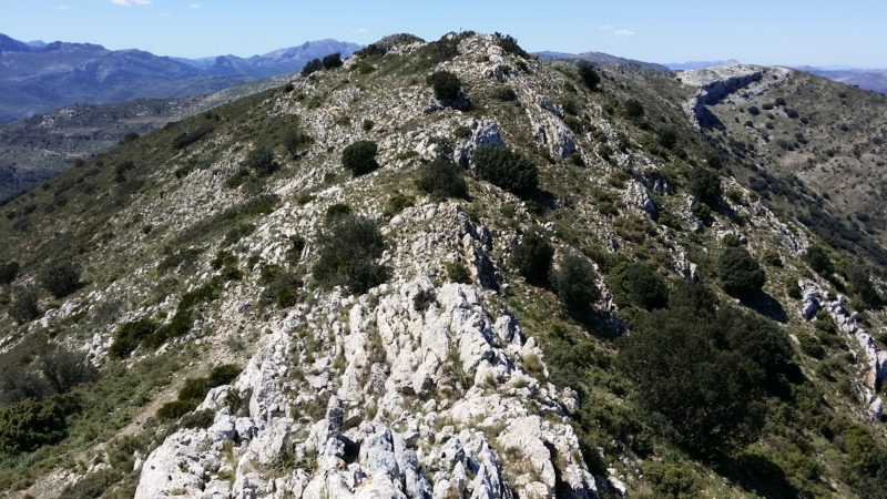 Mountain, grey rocks, vista, blue sky.